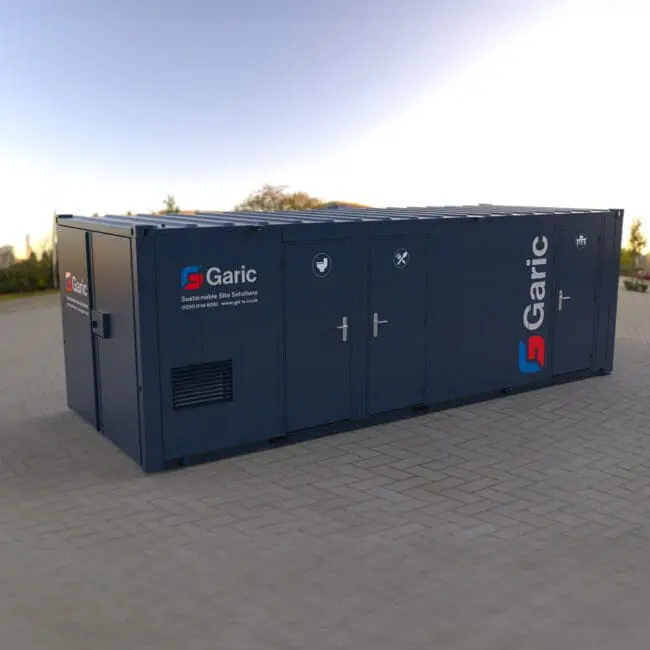 A large blue Combi Cabin 24 portable site cabin with multiple doors, placed on a paved outdoor area.