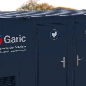Combi Cabin 24 portable toilets with Garic branding and white toilet symbols on the doors.
