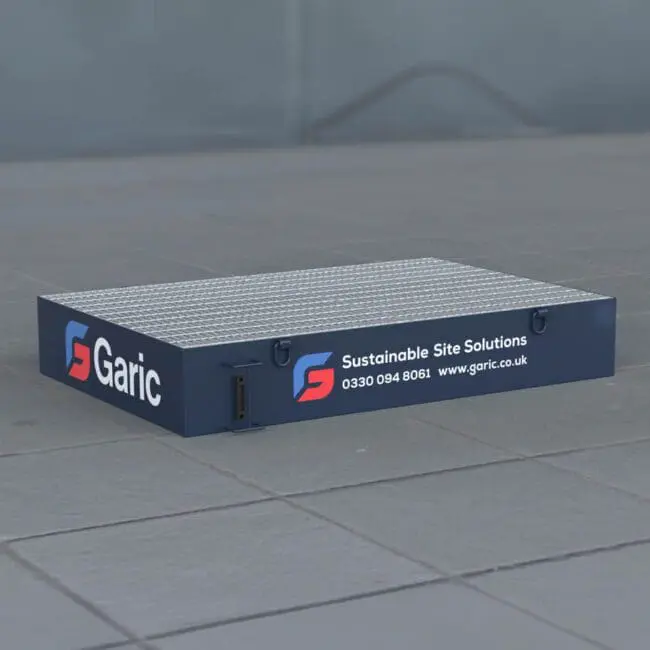 An Interceptor Drip Tray with a metal grid top sits on a tiled surface, showing Garic branding, contact information, and logo.