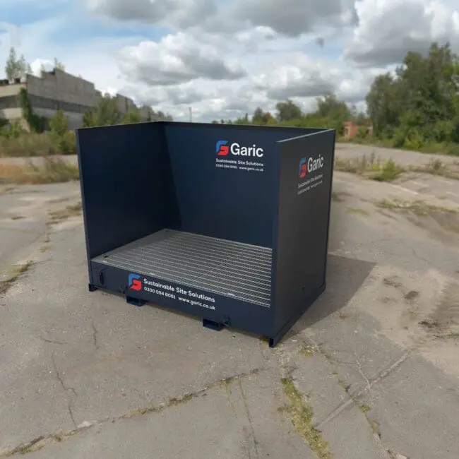 An Interceptor Wash Bay 12, large and dark blue, sits on cracked concrete outdoors beneath a cloudy sky.