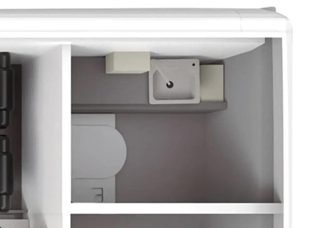 The Welfare Van features a compact gray and white bathroom equipped with a sink, toilet, and shelf.