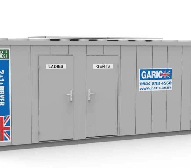 Grey portable restroom unit with UK flag, labeled Ladies, Gents, and Dryer, branded Garic with contact details.