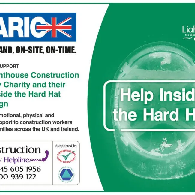 Poster promoting the Help Inside the Hard Hat campaign with a hard hat and construction helpline details.
