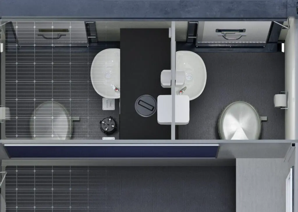 Top view of two Eco Cabin+ 24 restroom stalls, each with a sink and toilet, separated by a shared black partition.