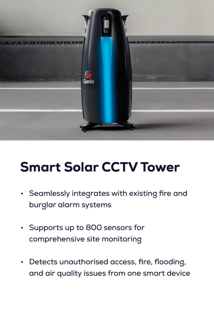 A black Smart Solar CCTV Tower with a blue stripe, standing indoors on a grey floor.