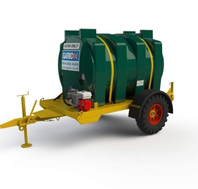 A green, towable water bowser trailer with yellow frame and black tires, viewed on a white background.