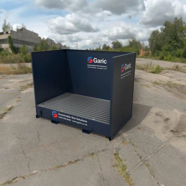 An Interceptor Wash Bay 12, large and dark blue, sits on cracked concrete outdoors beneath a cloudy sky.