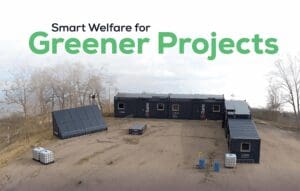 Aerial view of modular containers with solar panels and Smart Welfare for Greener Projects text.